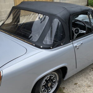 MG Midget MK III soft top, produced in Haartz Colonial Vinyl and comes with 8 Tenex fasteners and 3 plastic heat sealed windows