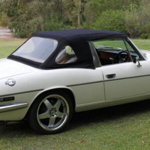 Triumph Stag soft top, produced in Haartz Stayfast Canvas and comes with plastic window and zipper
